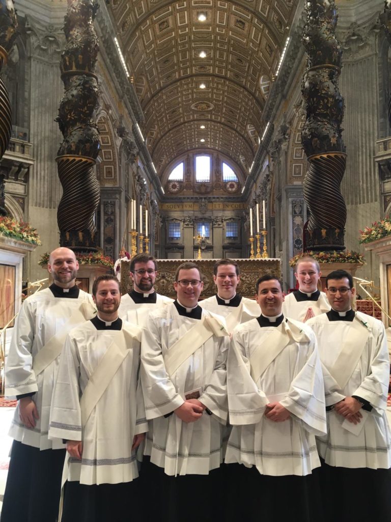 Eight of the thirteen deacons who assisted at Mass in front of the baldacchino in St. Peter's
